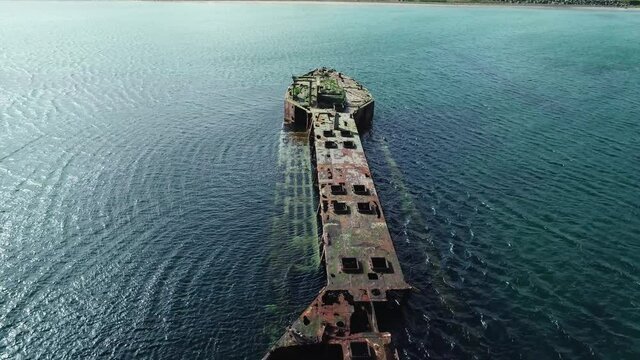 Slow motion, Wreck of Juniata, an old abandoned ship at Inganess Bay on the mainland of Orkney, Scotland.