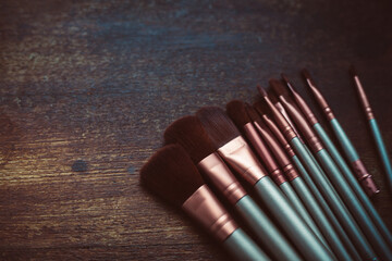 closeup photo of a selection of makeup brushes - 459322698