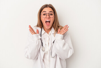 Young doctor Russian woman isolated on white background surprised and shocked.