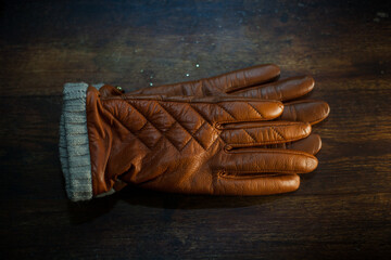 closeup photo of a pair of stylish leather gloves - 459323234