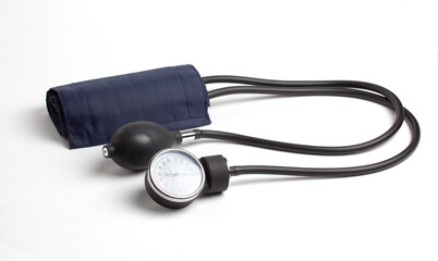 Sphygmomanometer on white background, manual tonometer traditional medical equipment
