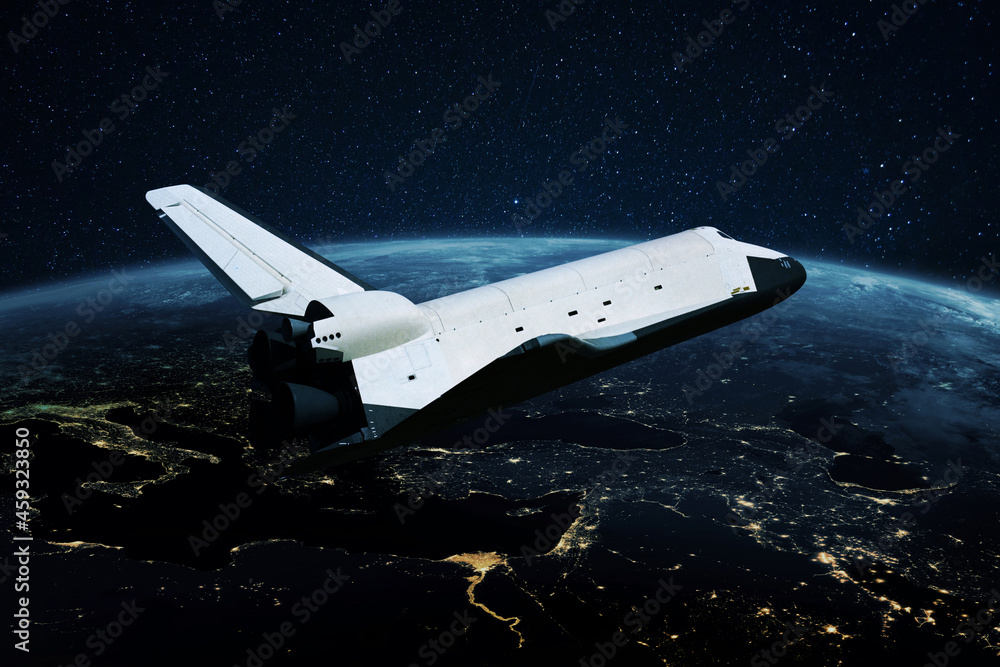Poster space shuttle rocket flies in open space over the night planet earth with bright lights of megacitie