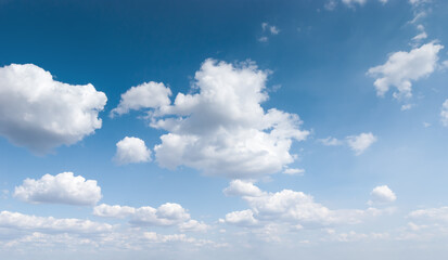 Naklejka na ściany i meble Blue sky with clouds on a Sunny day.