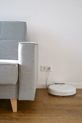 robot cleaner in white room