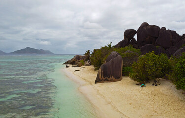 Top view of a beautiful emerald beach with corals in the Seychelles
