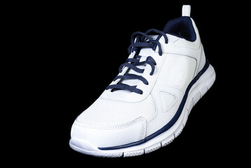 white sports sneaker isolated on black background