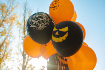 Halloween balloons in orange and black color