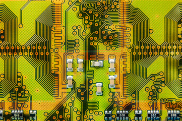 Golden high-speed printed circuit board close-up. Technology background