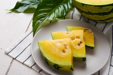 yellow watermelon slices on white background