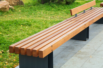 A modern bench on the street of the city.Improvement of the city.