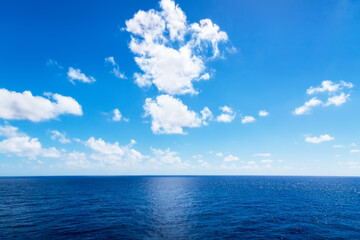 Seascape. Blue sky and white cloud.