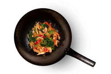 frying pan with meat and vegetables on top angle beautiful White and grey background