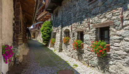 Idyllic sight in the beautiful village of Antagnod in the Ayas Valley, Aosta Valley, Italy. - obrazy, fototapety, plakaty