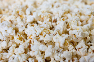 Salted popcorn, texture background. Film and cinema concept