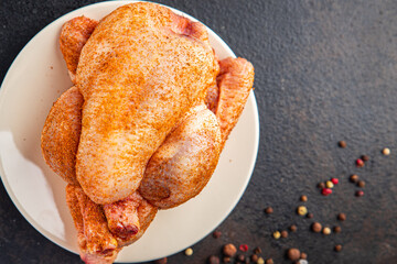 chicken coquelet raw whole chicken cocle meat poultry ready to bake or cook fresh portion ready to eat meal snack on the table copy space food background rustic. top view keto or paleo diet