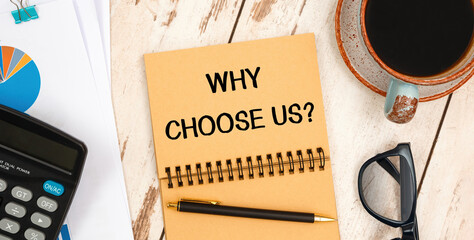 Notebook with text - Why Choose Us near office supplies.