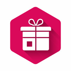 White Gift box icon isolated with long shadow background. Pink hexagon button. Vector