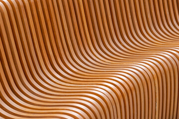 close-up full frame view of curved plywood public bench 
