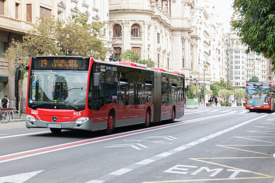 VALENCIA, SPAIN - SEPTEMBER 25, 2021: EMT red bus, the municipal transport company