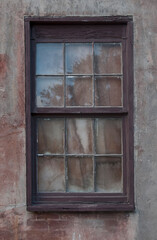 Fototapeta na wymiar old wooden window on a wall