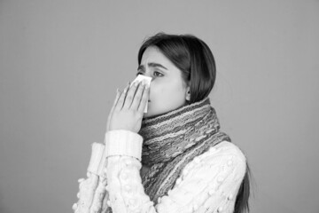 Sick. Runny nose. Sick woman sneezing. The concept of treating allergies or colds. Woman with...