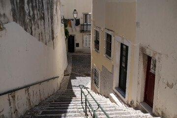 Fototapeta na wymiar View of the one of old streets of the Alfama district, Portugal.