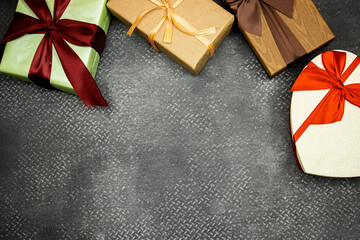group of gift boxes on grunge leather background, holiday concept