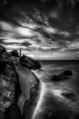 Long Exposure Shore with Rocks Black and White