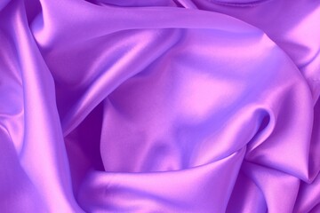 Delicate lilac fabric with beautiful pleats. Silk, satin are folded freely. It can serve as a background for the inscription. Pastel shades.