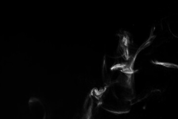 White steam smoke on solid black background with abstract blur motion wave swirl use as an overlay effect for vapor cigarette dry ice hot water and food soup