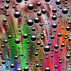 Black spheres rainbow design drops on a glass
