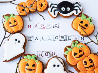 gingerbread cookies for halloween on white background and scary inscription