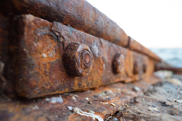 Old rusty rails close up background.