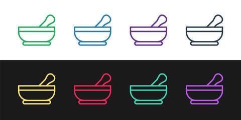Set line Mortar and pestle icon isolated on black and white background. Vector