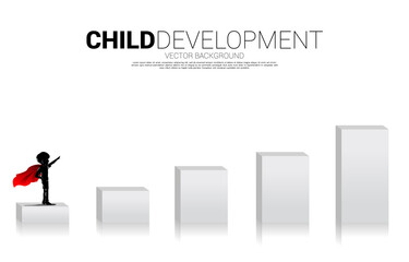 Silhouette of boy in superhero on bar chart. Concept of education start and future of children.