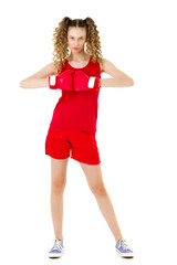 Teen girl with curly ponytails working out in gym