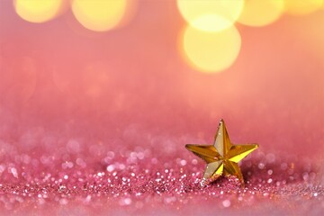 Wallpaper phone shining glitter.New Year and Christmas background. gold star in pink glitter on shining golden bokeh background.Beautiful festive background in rose gold tones.Shining texture.