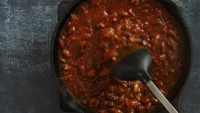 Stirring a Pan of Chili Con Carne