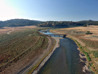 Photos of the Hidden Bridge at Folsom Lake. Usually submerged under 60 feet of water this bridge is visible due to the severe drought in California. 