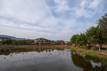 Fototapeta premium The lake in autumn reflects the scenery on both sides