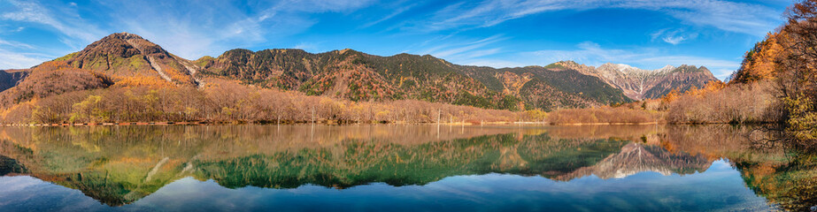 Fototapeta premium Nature landscape at Kamikochi Japan, panorama autumn fall foliage with pond and mountain