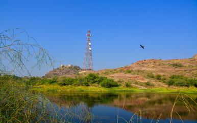 Telecommunication pole on the hill