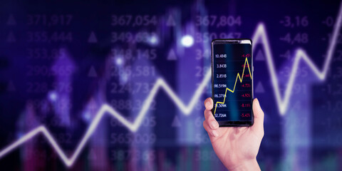 Businessman show finance graph on cellphone screen