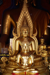 Golden Buddha statues, inside the temple. Chiang Mai, Thailand