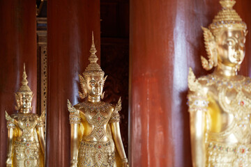 Golden Buddha statues, inside the temple. Chiang Mai, Thailand