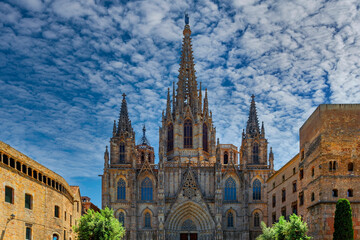 Fototapeta na wymiar Gothic cathedral in Barcelona under cloudy sky