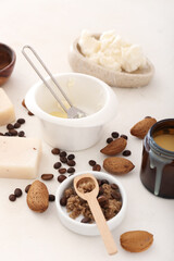 Different natural ingredients for homemade cosmetics on white background