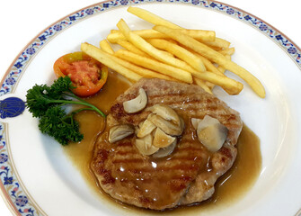 Pork chop at European restaurant for lunch.