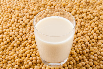 soy milk in glass on soy beans. 