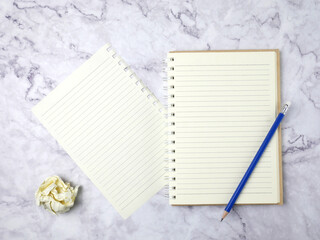 Notebook on marble texture background.
